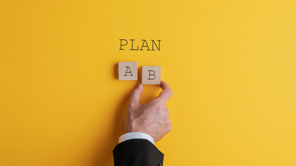 Businessman choosing plan B