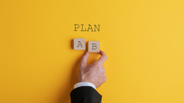 Businessman choosing plan B