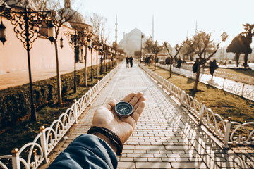 the compass in my hand in the background sultan ahmet mosque, Compass, navigational compass, travel...