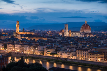 Fototapeta premium Florence panoramic view from above during blue hour with historical buildings Duomo churches and Ponte Vecchio