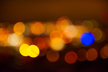Out of focus lights of a city at night.