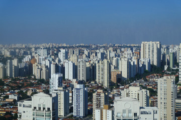 Fototapeta premium Miniature rooftop view of downtown skyscraper buildings by tilt-shift in Sao Paulo Brazil