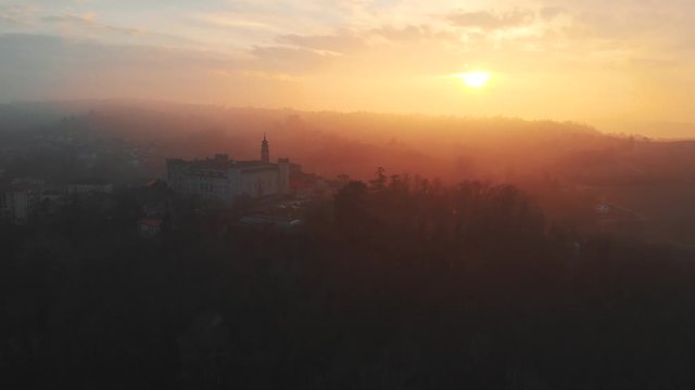 Castle of Costigliole d'Asti (Piedmont - Italy). Sunset light view with white castle bright