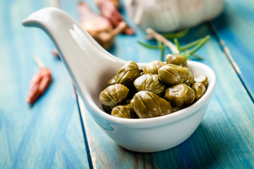 Pickled green capers close-up