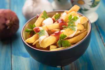 Canadian poutine potato fries with cheese and gravy