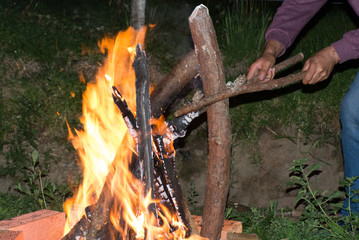 night bonfire trunks burning in the fire