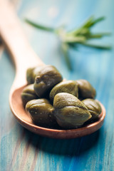Pickled green capers close-up