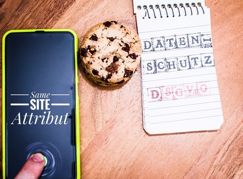 Accept cookies with a tablet to illustrate cookie banners for websites with cookies and same site attribut an in german datenschutz und dsgvo in english privacy and gdpr