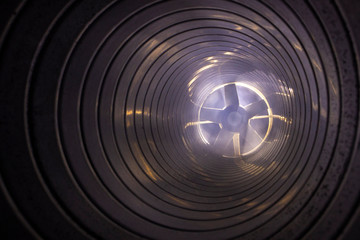 smoke and fire inside the air duct in the ventilation system, the front and back background is...