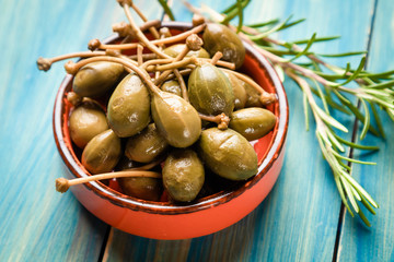 Pickled green capers close-up