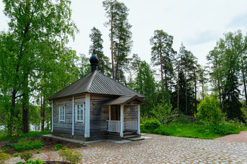 Fototapeta na wymiar Wooden skete on the Valaam island, Karelia in Russia