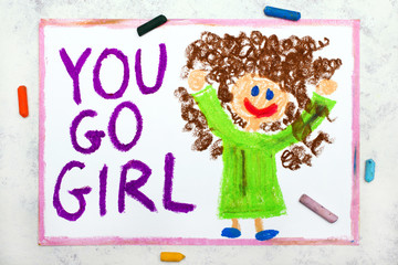 Photo of colorful drawing: Smiling young woman and hand drawn lettering phrase YOU GO GIRL - 318722867