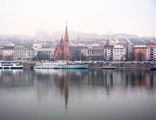 Fototapeta premium View on Buda riverbank covered in snow in Budapest, Hungary
