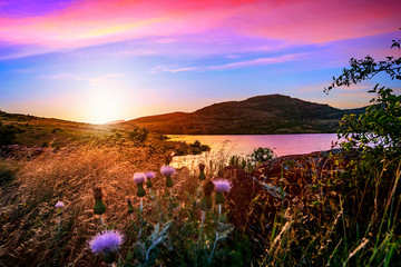 Violet hour at sunset in the valley of Wichita Mountains Wildlife Refuge near Lawton, Oklahoma, USA.