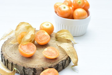 natural cape gooseberry on wooden background