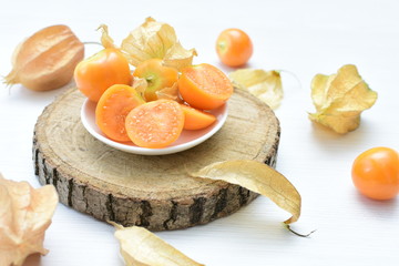natural cape gooseberry on wooden background