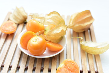 natural cape gooseberry on wooden background