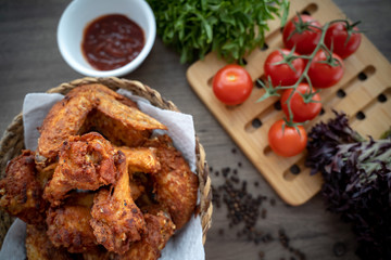 crispy fried chicken in the basket with salad