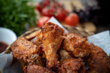 crispy fried chicken in the basket with salad