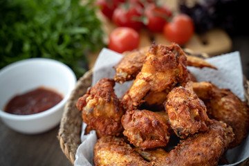 crispy fried chicken in the basket with salad
