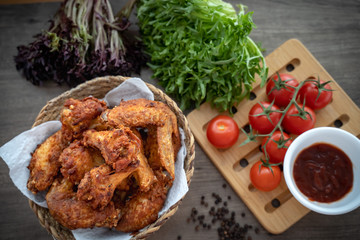 crispy fried chicken in the basket with salad