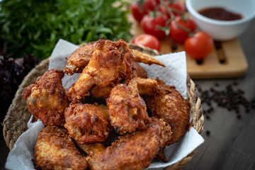crispy fried chicken in the basket with salad