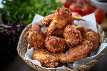 crispy fried chicken in the basket with salad