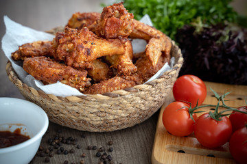 Breaded crispy fried kentucky chicken drumctick in the basket