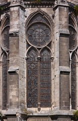 Pointed and round gothic windows, tracery and buttresses at Beauvais cathedral in France