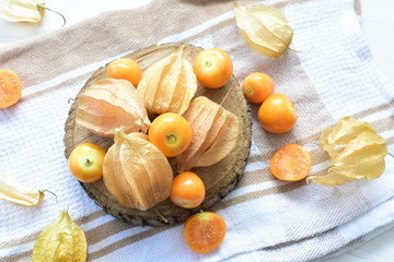 natural cape gooseberry on wooden background