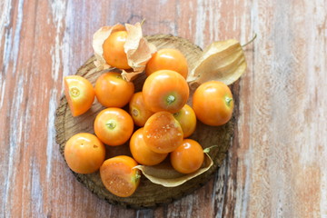 natural cape gooseberry on wooden background