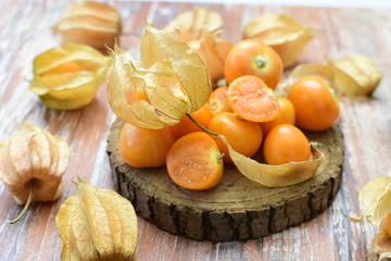 natural cape gooseberry on wooden background
