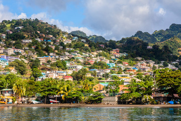 Coastline full of boats with lots of living houses on the hill, Kingstown, Saint Vincent and the...