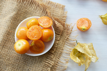  natural cape gooseberry on wooden background