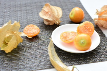  natural cape gooseberry on wooden background