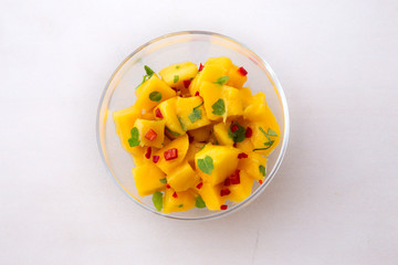 mango chunks with red chiilli and mint