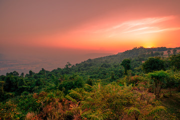 abstract background of nature,a high angle that can see the scenery around (trees,meadows,mountains, the light of the twilight in the evening) and the wind blowing through the large mountains
