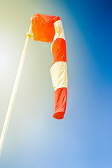 Tranqiul Windsock Against Blue Sky With Bright Sunlight