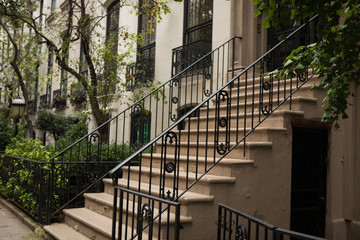 Black iron railing entrance to home in manhattan