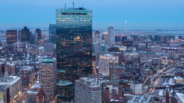 Boston skyscrapers time-lapse during sunset,Airport in background