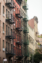 Fototapeta premium Apartment buildings on street in Manhattan New York