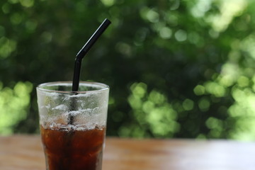 glass of cola with ice