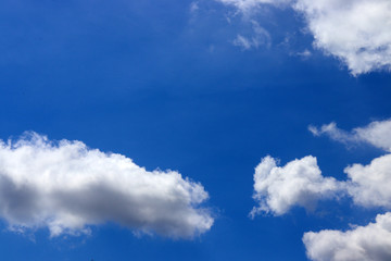 Obraz premium blue sky white space cloud background with light bright of sun. weather at day and sky clear and sunlight. view blue sky weather in summer and air beauty