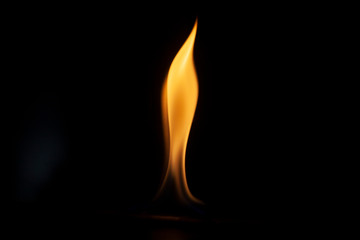 Tongue of fire flame in the dark. Ignition of oxygen in space. Fiery background. Fire of ether in...