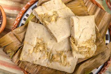 Oaxacan tamal made of corn chicken pork and chili