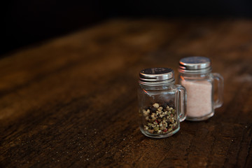 Salta and Pepper on wood table