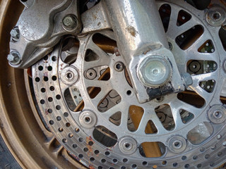 Motorcycle wheels with brake system parts