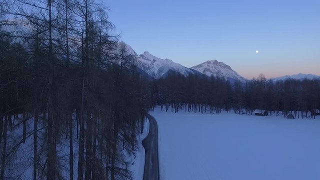 Ascending through trees, view to Mieminger Mountains, Bavaria