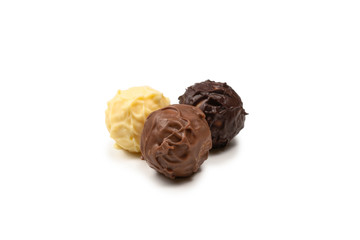Chocolate truffle isolated on white background.
