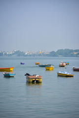 Fototapeta na wymiar Boats in the upper lake at Bhopal which is also known as 'city of lakes'.